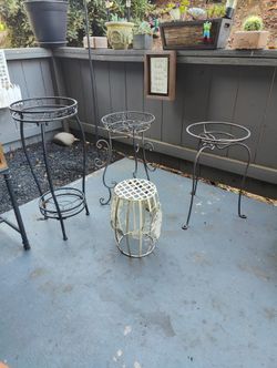 Ornate metal Plant stands, set of 4. Different sizes