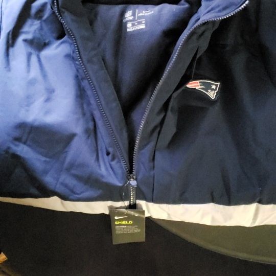 NIKE JACKET. CHARGERS And PATRIOTS
