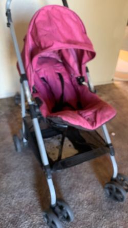 Pink front or back facing stroller