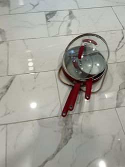Three good quality pots with glass covers (all for $15)