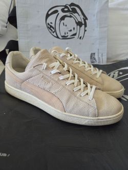 Puma States MII beige snake-patterned leather low-top sneakers.