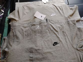 10 brand new Nike shirt some medium some large and some small all brand new $40 shirts
