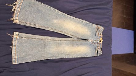 Light Wash Flare Jeans with Frayed Hem