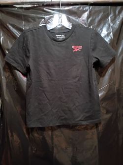 Kids size medium black short sleeve crew neck with a small red Redbox vector logo on the left chest. Kids size medium.