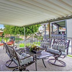 Four Patio Swivel/rocker Chairs