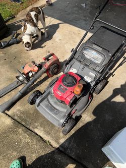 lawn mower, blower, and cuter