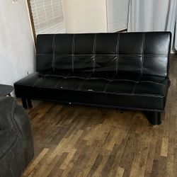 Black Faux Leather Tufted Futon Sofa Bed