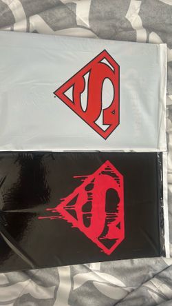 Sealed  Adventures of Superman #500 and Superman #75