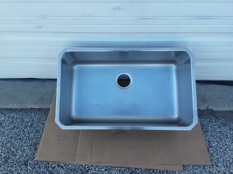 One Deep Stainles Steel Sink Under the Counter Type And 29 3/4" X 17 3/4" Like New.