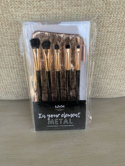 5 piece NYX makeup brushes and rose gold pouch