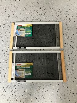 Adjustable Window Screen Pair 2 of them( 10" high 19"-33" wide )