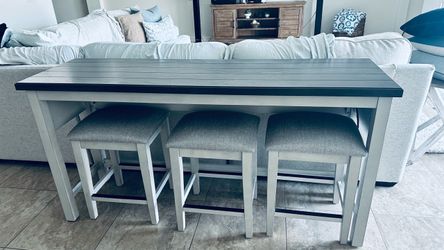 Eating table with three stools