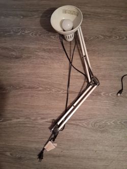 Desk light has no stand and file shelfs