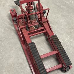 Torin Big Red 1500 lb capacity hydraulic motorcycle and ATV jack. 