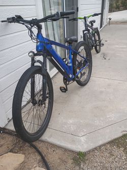 Schwinn marshall ebike in blue and Genesis v2100 full suspension mountain bike