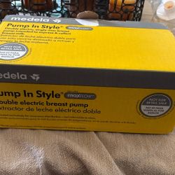 Medela Breast Pump And Manual Hand Pump