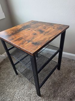 Side table or nightstand
15.75"w x 15.75"d x 20"h
has two lower shelves
