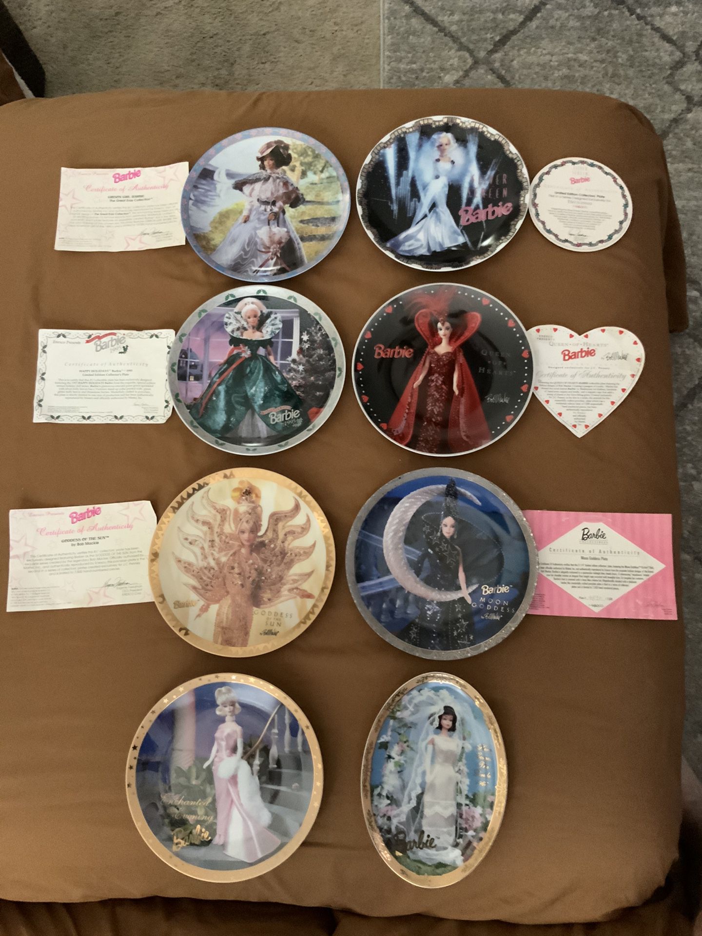 8 BARBIE COLLECTORS PLATES SOME WITH COA SEE PHOTOS ALL FOR $50.00
