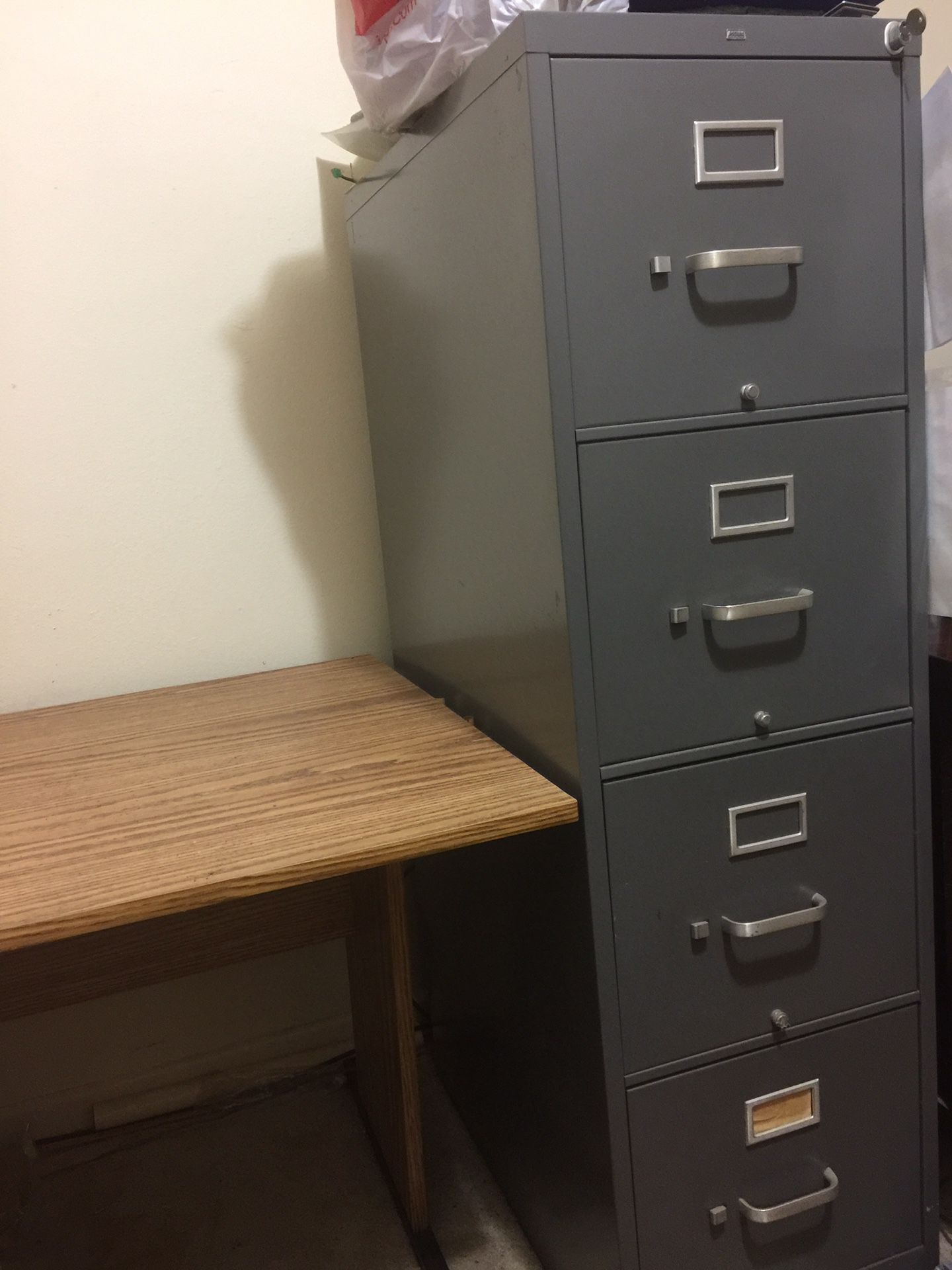Tall grey metal 4 drawer filing cabinet w/ key