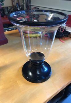 2 Glass and iron hurricane candle holders.