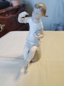 Lladro ,Girl with Doll $75 cash