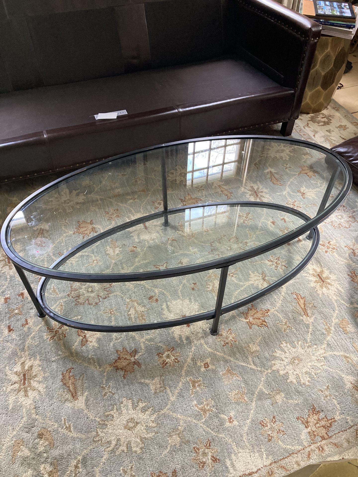 Oval Glass And Black Iron Coffee table