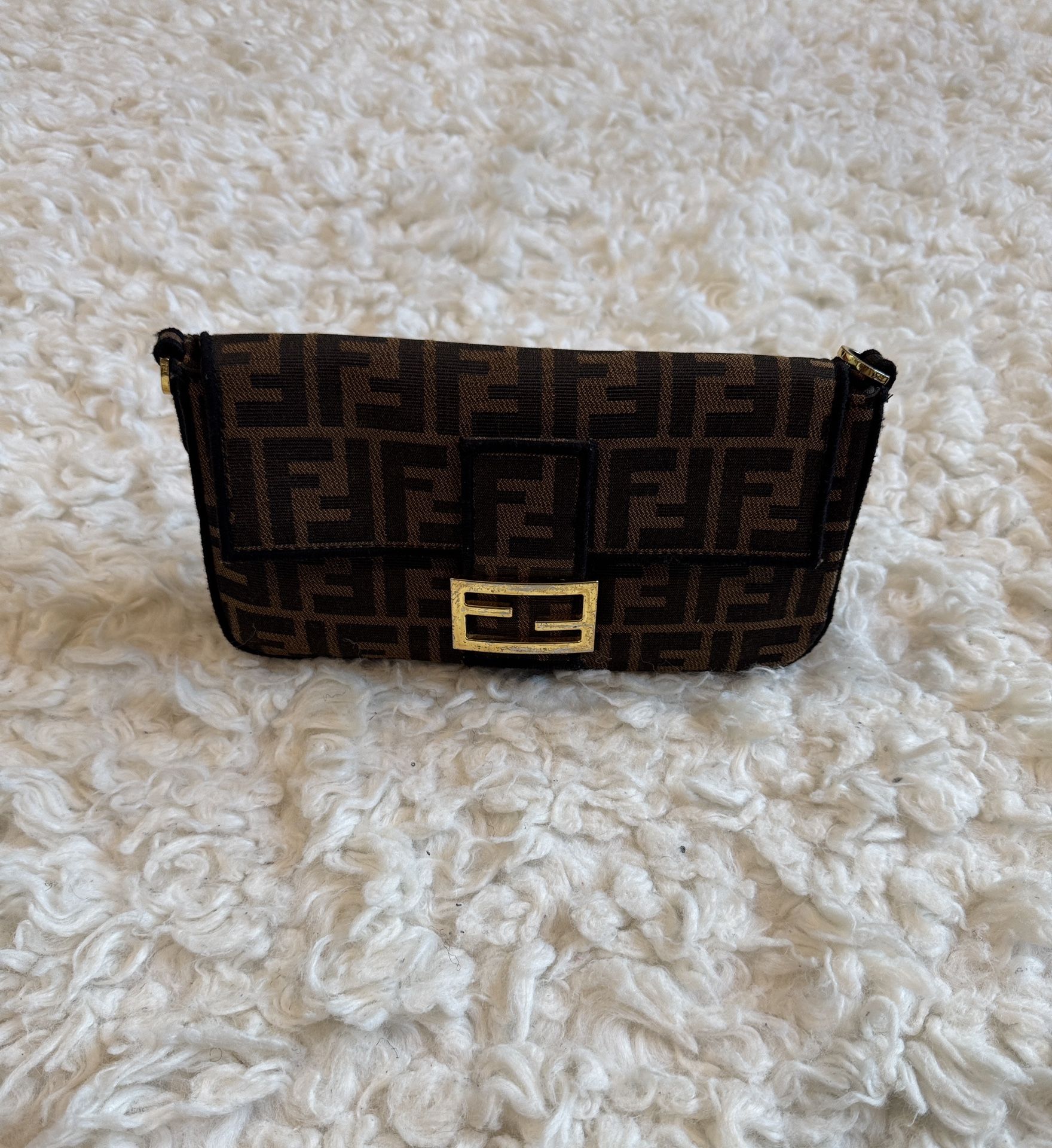 Fendi black and brown clutch bag with gold accent