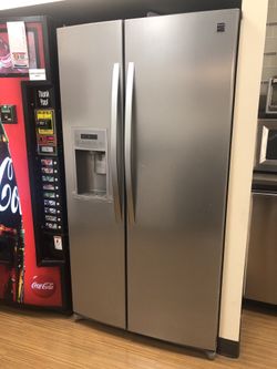 Like new microwave , stainless steel refrigerator with water and ice.