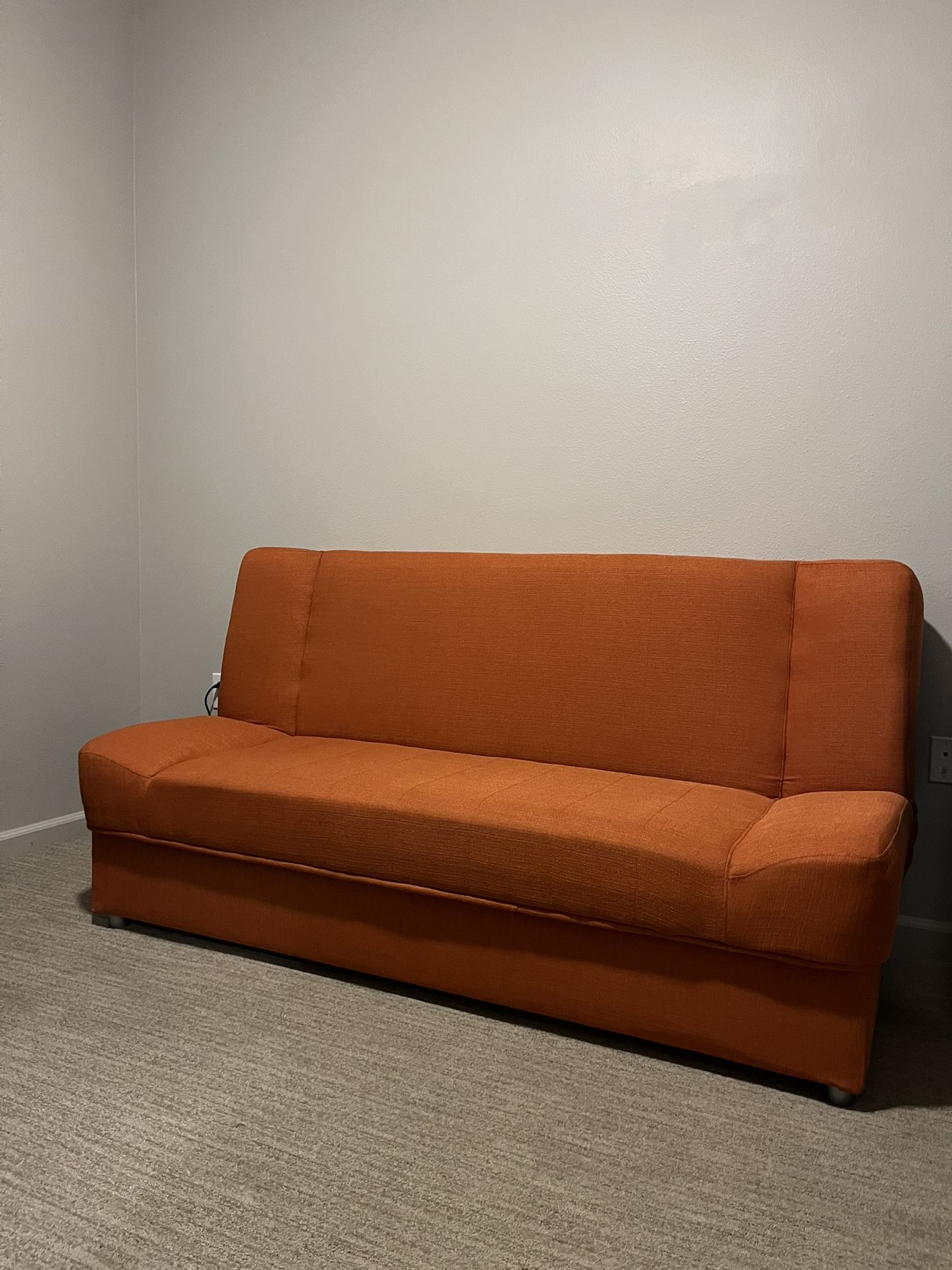 77” Upholstered futon/ with storage underneath. Price Is Negotiable. 