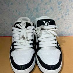 Louis Vuitton trainer in black and white color scheme