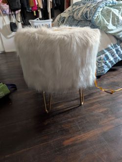 White faux fur ottoman