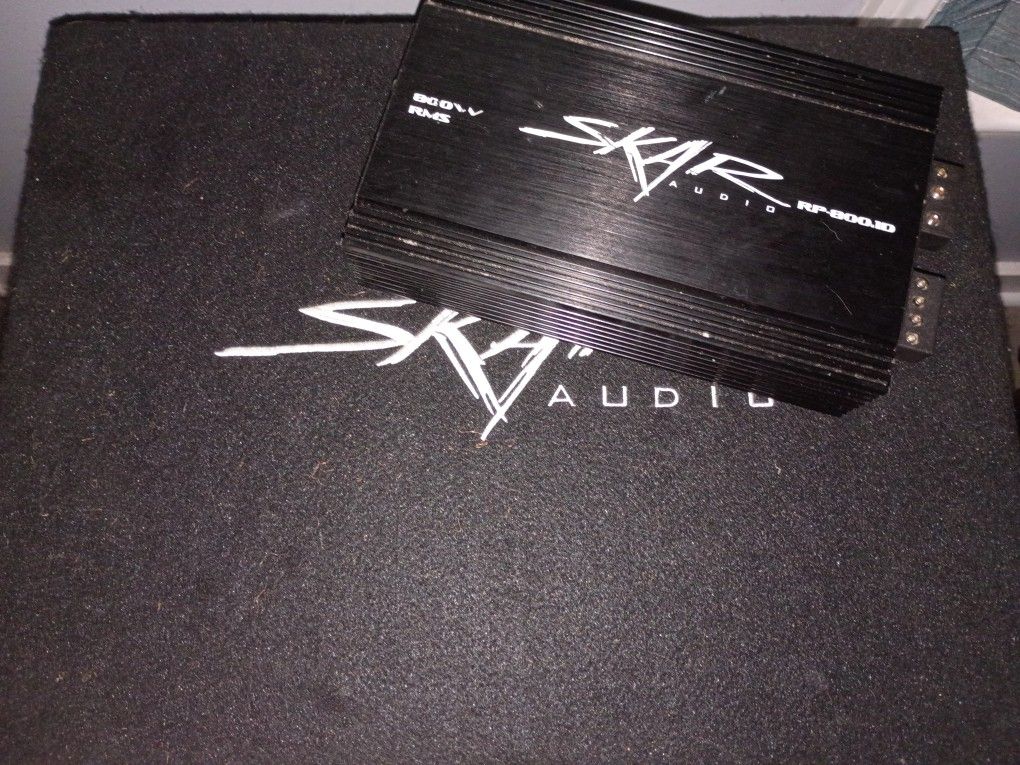 12" SINGLE SKAR AUDIO SUBWOOFER AND AMP IN ENCLOSURE