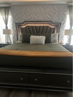 Grey bed frame with matching nightstands plus mattress