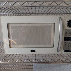Great Microwave! Installed an over the stove microwave. Clean, Lightly Used,  No Longer Need This One 