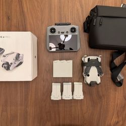 DJI - Mini 4 Pro Fly More Combo Drone and RC 2 Remote Control with Built-in Screen