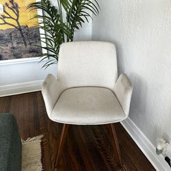 Upholstered padded armchair 