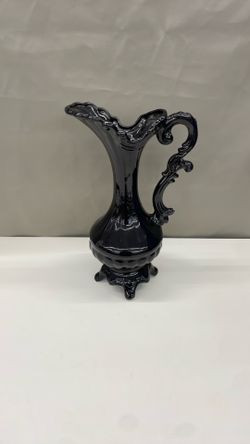 Decorative pitcher. Item No 764 (Shopgoodwill)