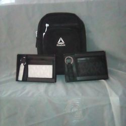 Michael Kors Card Holders With Keychains. White Print As Well As Black Print Of Classic MK . Reebok Mini Backpack. 