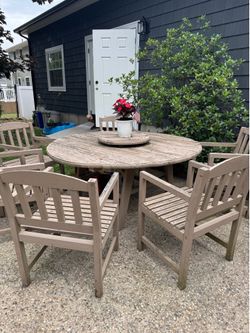 Round wood table with 6 chairs
