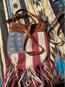 Cool looking Stars and fringe shoulder bag.