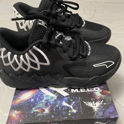 BRAND NEW - MELO. PUMA.  Size 6 Youth 