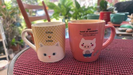 Two coffee/tea/ water mug cups