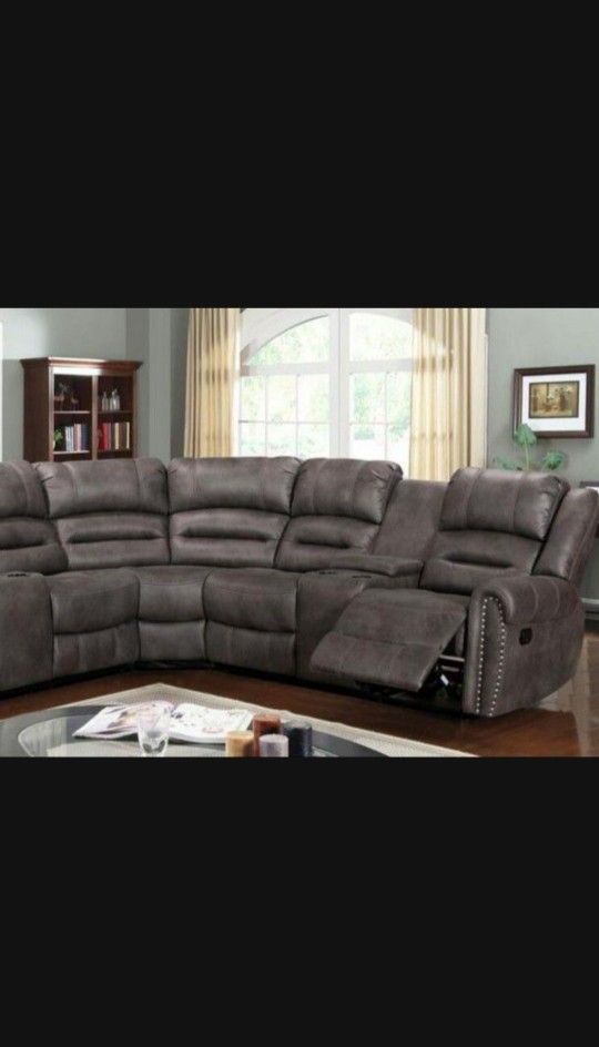 Kenedy Brown reclining Sectional Sofa