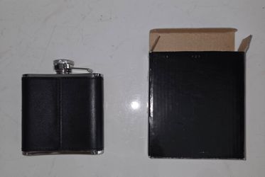 New Ciclon Brand Leather Wrapped Stainless Steel Hip Flask, 4" wide, 4" tall, 1" thick. Black faux leather cover, embossed Ciclon logo, comes with ori