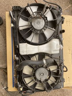 2009Honda Fit sport Radiator 2 fans and water container for Automatic transmisión
