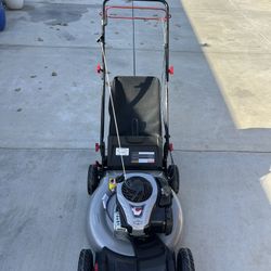 Exclusive Murray 22 in. 140 cc Briggs & Stratton Walk Behind Gas Self-Propelled Lawn Mower with Front Wheel Drive and Bagger 