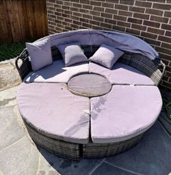 Patio wicker daybed with canopy. Read the description below
