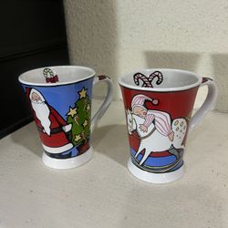 set of two "Ursula's Christmas" ceramic coffee mugs designed by Ursula Dodge