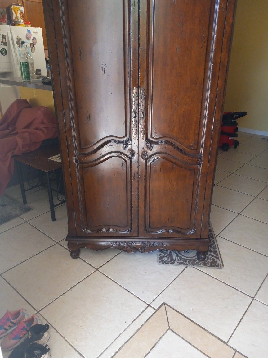 Armoire. Real. Not That Chep Particle Board.