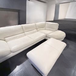Sectional white leather couch